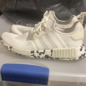 Men’s black cream and white adidas NMD size 10.5